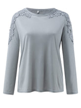 Front view of light gray FloraFrost™ Tee highlighting lace floral cutout shoulders and round neckline.