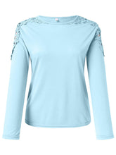 Front view of pastel blue FloraFrost™ Tee highlighting lace floral cutout shoulders and round neckline.