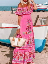 Model side view wearing fuchsia pink Isadorae Maxi Dress at sunset boat event.