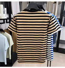 Back view of Gallant Rider contrast stripe shirt on hanger in Pastel Orange.