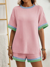 Detail of Blush Pink fabric and contrasting trim stitching.