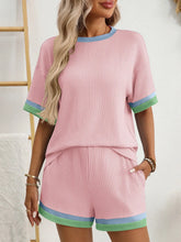  Model wearing Glowthentic™ Blush Pink Shorts Set, feminine and chic.