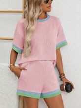Model sipping a smoothie at a trendy café in Glowthentic™ Blush Pink set.