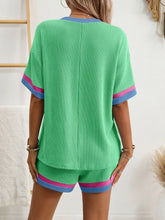 Back shot of Glowthentic™ Green set featuring comfy elastic waistband.
