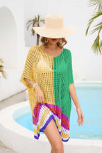 Gold Model in Valenyra openwork contrast cover-up raising hem, styled with beach hat