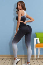 Back view of black Gradient Flow Momentum set highlighting smooth contour fit.