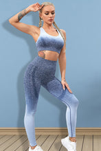 Model in Dusty Blue Gradient Flow Momentum set, front view showing ombré tank and high-waist leggings.