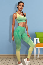 Model in Mid Green Gradient Flow Momentum set performing yoga stretch.