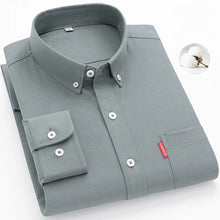 Folded front view of men’s gray Business MVP Elite long sleeve button-down shirt showcasing collar, placket, and sleeve cuff