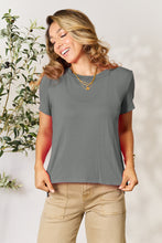 Model wearing Full Size Round Neck Short Sleeve T-Shirt in soft gray