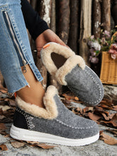 Model wearing the grey Furry Suede Round Toe Flat Sneakers, gray furry suede round toe flat sneakers faux fur suede detail