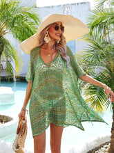 Green Azalyra openwork V-neck cover-up front view poolside styled with straw hat 