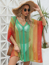 Model styled in green Coastal Spectrum openwork contrast V-neck cover-up with beach sandals and accessories poolside