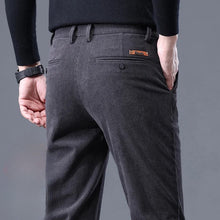Zoomed in back view of grey Corduroy trousers highlighting pocket detail.
