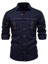 Front view of navy blue linen-blend button down shirt with collar and pockets