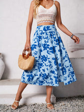 Havélyra Bloom Skirt front view in Ultra Marine hibiscus print