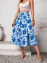 Side view highlighting slit on Havélyra Bloom Skirt ultra marine