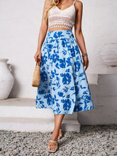 Walking side view of Havélyra Bloom Skirt front view in Ultra Marine