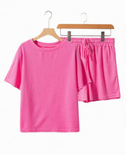 Healed & Waffled Up Lounge Set in hot pink, close view on a hanger