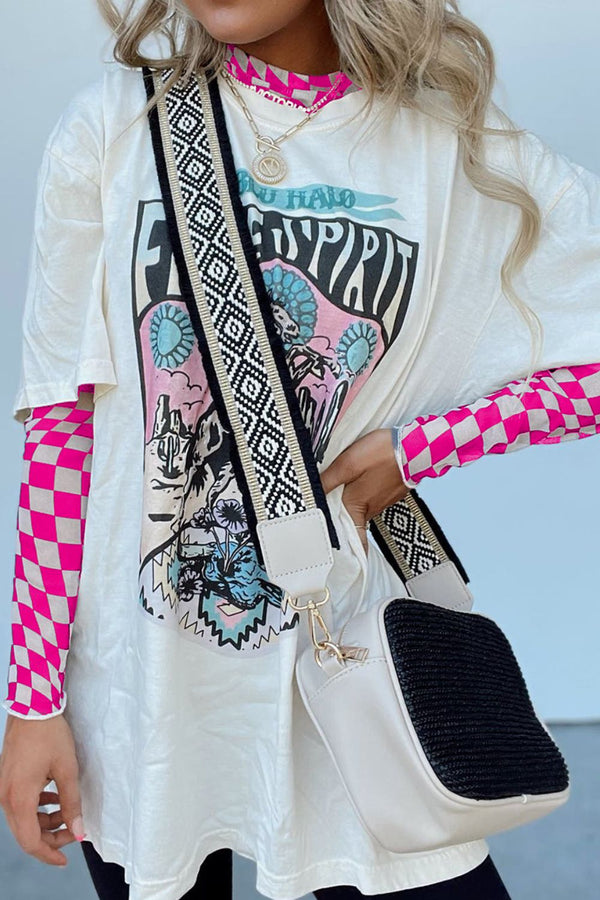 Model wearing the hot pink ChicGrid checkered mock neck blouse paired with distressed leggings, layered tee, long wide straped purse, and
jewelry, styled for a chic casual look.