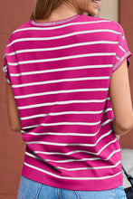 Back view of hot pink striped knit round neck short sleeve top, showing clean, classic design with short sleeves and fitted knit trim.