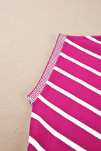 Close-up of soft striped knit fabric and knit trim detail on short sleeve top, in hot pink.