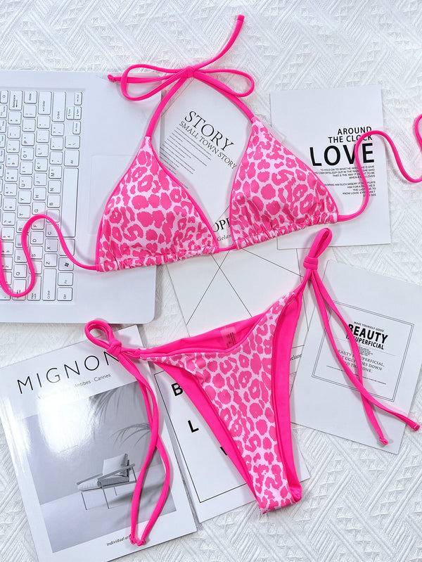 Hot pink leopard print halter neck tie side bikini set front flat lay view