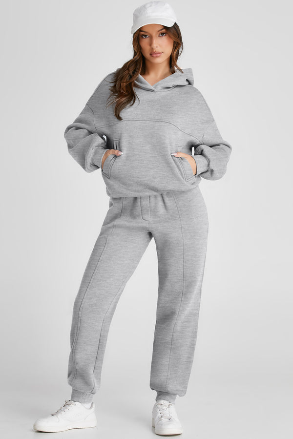 Iravelle Hoodie and Pants Active Duo styled with white baseball cap and sneakers