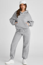 Iravelle Hoodie and Pants Active Duo styled with white baseball cap and sneakers