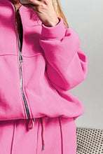 zoomed in close up of kalorene set fuchsia pink highlighting 50/50 premium cotton and polyester fabric