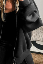 Kalorène Zip Up Long Sleeve Top and Pants Set in black styled for urban casual looks, hoodie close up