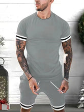Men's plus size gray Kavrix MotionSet front view on model.