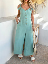 Side angle of gum leaf jumpsuit highlighting knotted straps and relaxed fit.