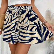 Khaki AurevaBoho™ Prism Ease Shorts left side angle showing flowy wide leg