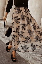 Khaki Elverra Bloomline Maxi Skirt in motion styled with black top and heels