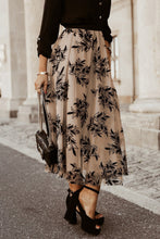 Side view of Khaki Elverra Bloomline Maxi Skirt showcasing botanical embroidery