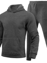 Men's dark gray Korven ModeSet hoodie and pants set front view on invisible mannequin.