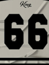 Back close-up showcasing bold King print, 66 number, and horizontal stripe accents