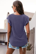 Lavender ruffled round neck cap sleeve blouse back view
