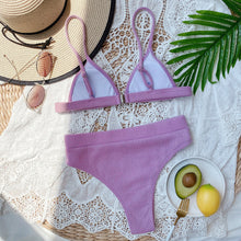 Back flat lay of lavender spaghetti strap ribbed bikini set showing back clasp closure and adjustable straps