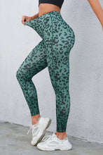 side view stretch fabric in leopafit contour leggings turquoise