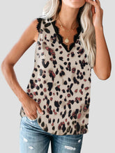 Model wearing Lace Detail V-Neck Tank in leopard with lace neckline