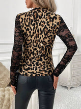 Back view of the Lace Patchwork Mock Neck Long Sleeve Top, showcasing the delicate lace panel and flattering fit in classic leopard.