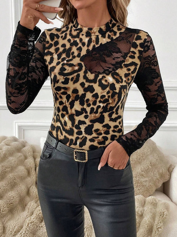 Model wearing the Lace Patchwork Mock Neck Long Sleeve Top in leopard, paired with faux leather pants and heels for a polished dinner-ready look.