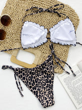 Leopard frill trim halter neck bikini set back flat lay view