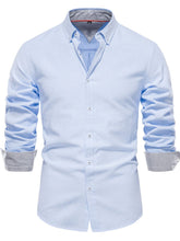 Front view of men’s light blue Apex Flourish quarter-sleeve button-down shirt
