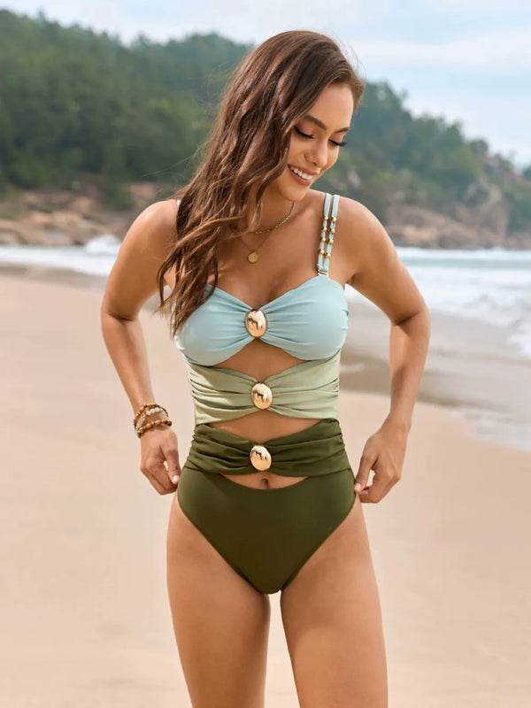 Model wearing light blue color block sweetheart neck one-piece swimwear front view pose beachside