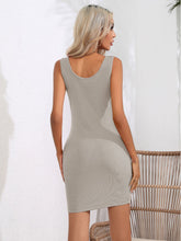 Model back view showcasing the light gray Curvalicious Allure Bodycon Mini Dress with adjustable wide straps and body-skimming silhouette.