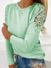 Model styled in light green FloraFrost™ Tee with embroidered jeans and accessories for a formal look.