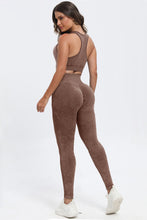 Rear view of woman lounging in dark brown LineaFlow Vitality set.